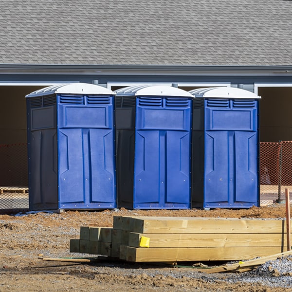 what is the cost difference between standard and deluxe portable restroom rentals in Solsville